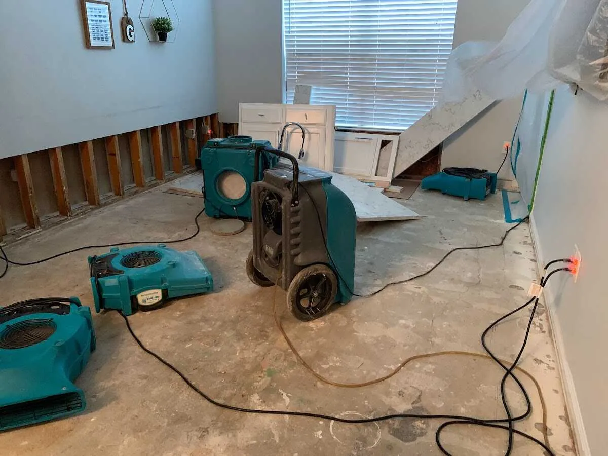 Dehumidifier in flood-cut room for Water Extraction & Removal in Purcell